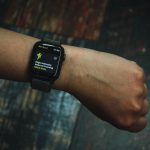 A fitness smart watch on a wrist